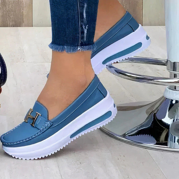 Close-up of women's orthopedic shoes showcasing comfortable, supportive insole for foot health.