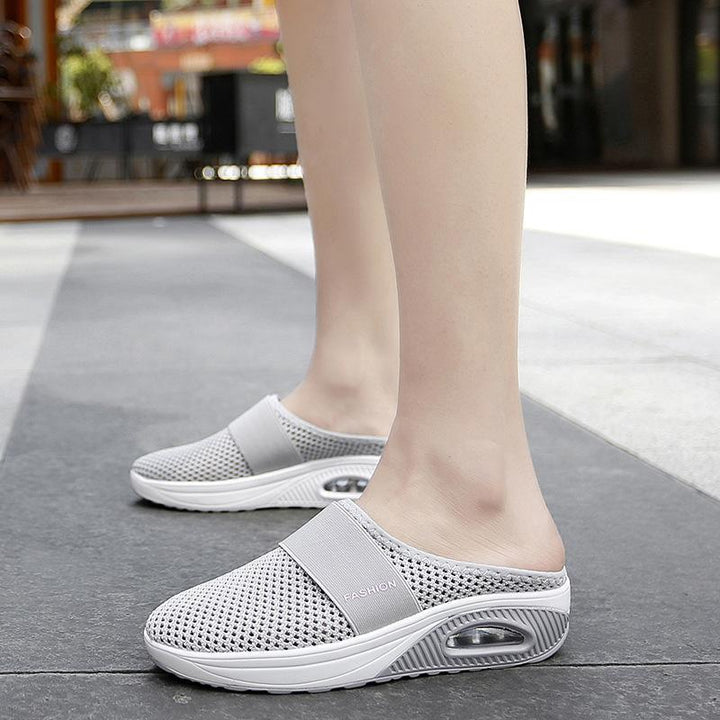 Supportive women's slip-on shoes with air cushion for superior walking comfort and arch support.