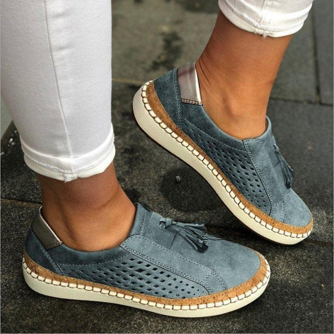Lightweight women's orthopedic slippers, designed for everyday comfort & foot support with a durable sole.