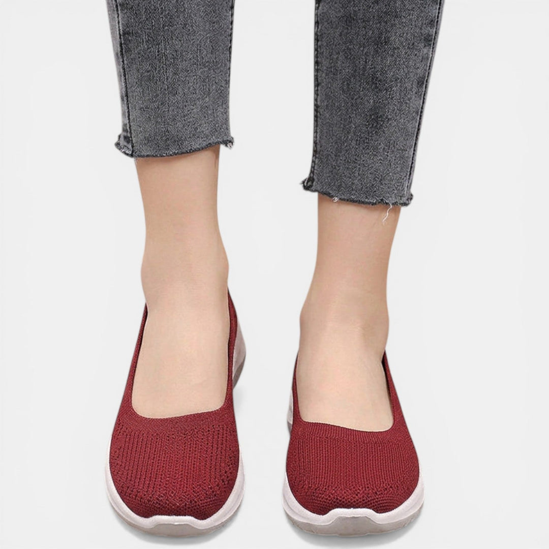 Modern women's slip-on sneakers with arch support, designed for orthopedic comfort & breathability.