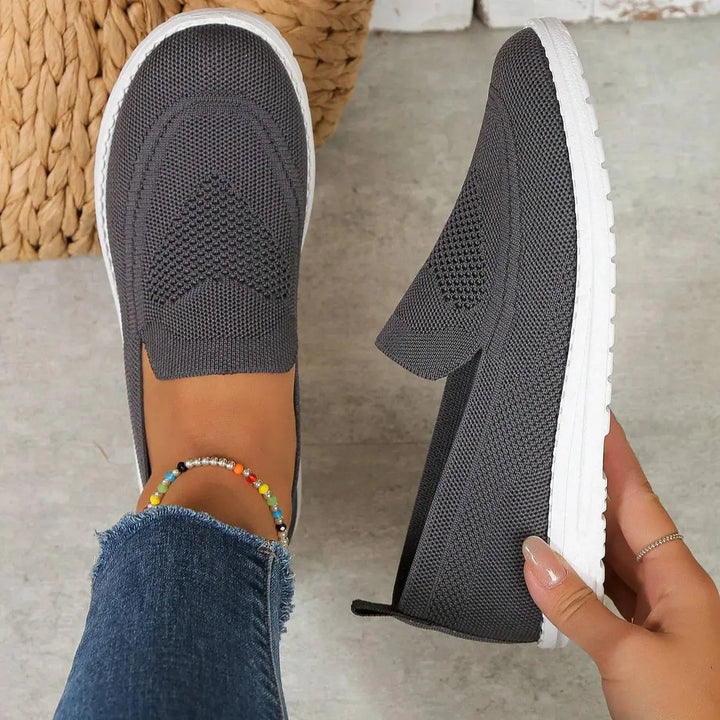 Women's orthopedic slip-on trainers with arch support & cushioning for ultimate comfort and foot wellness.