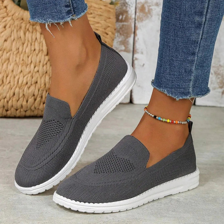 Stylish women's everyday slip-on trainers, featuring orthopedic arch support & comfort for foot wellness.
