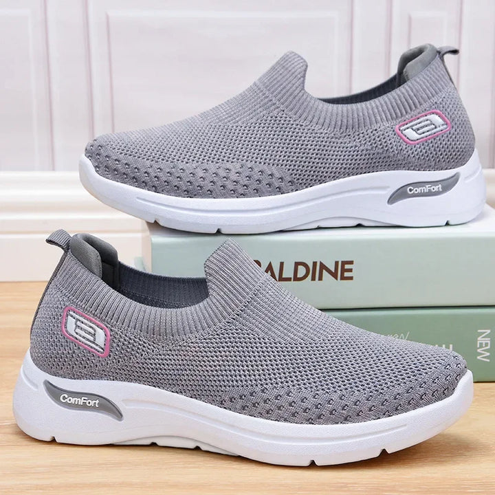 Lightweight & comfortable women's slip-on trainers, breathable design for everyday casual wear.