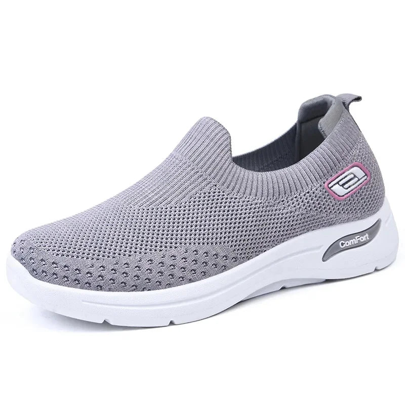 Slip-on orthopedic trainers for women, providing foot pain relief, arch support, and comfortable walking.