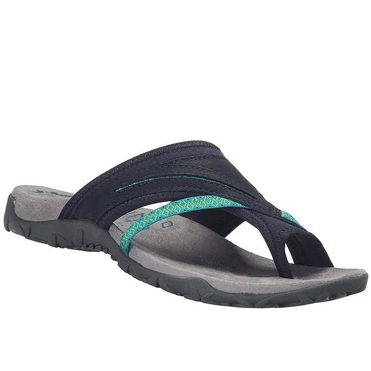 Versatile women's orthopedic indoor/outdoor slippers with arch support, toe-loop, and cross-strap for comfort.