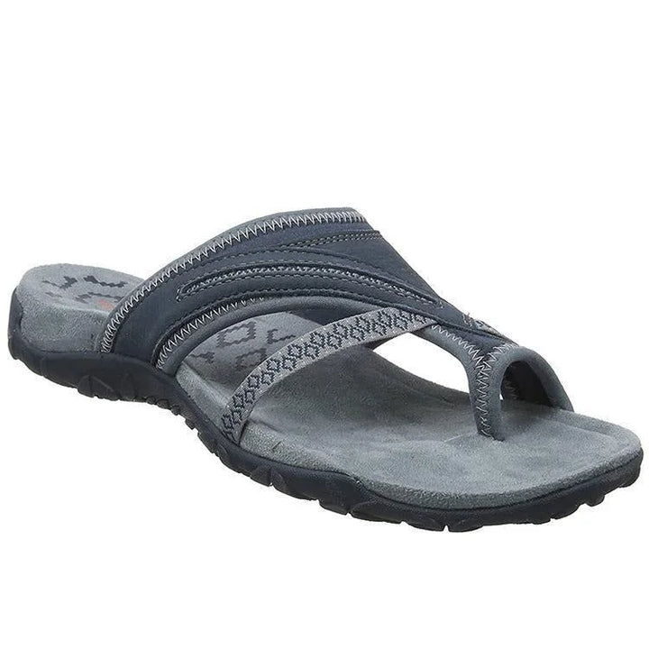 Casual women's orthopedic sandals with arch support, toe-loop, and cross-strap for all-day foot comfort.