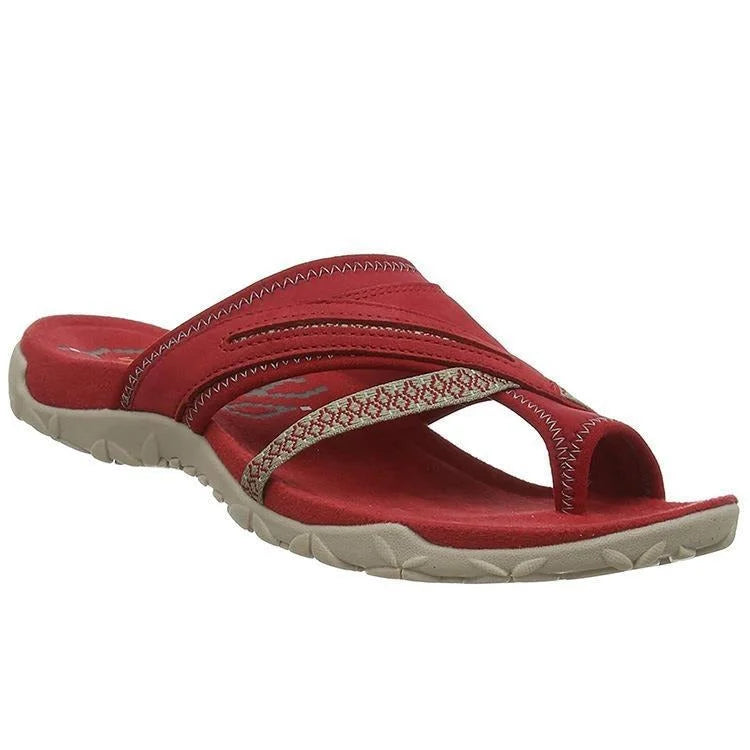 Women's orthopedic slippers featuring advanced arch support and a comfortable toe-loop design for foot health.