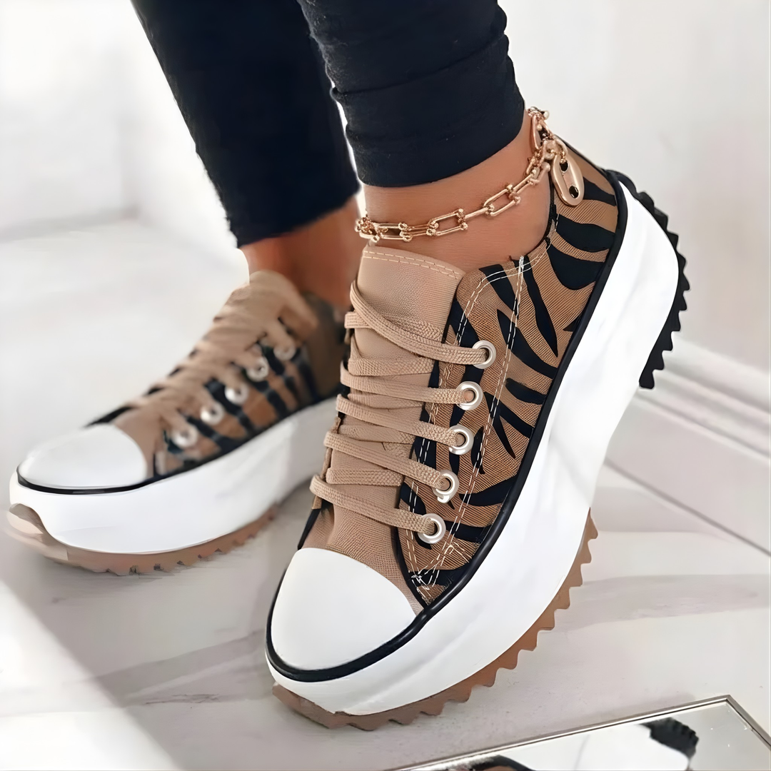 Cushioned women's platform sneakers with arch support for all-day comfort & stylish everyday wear.