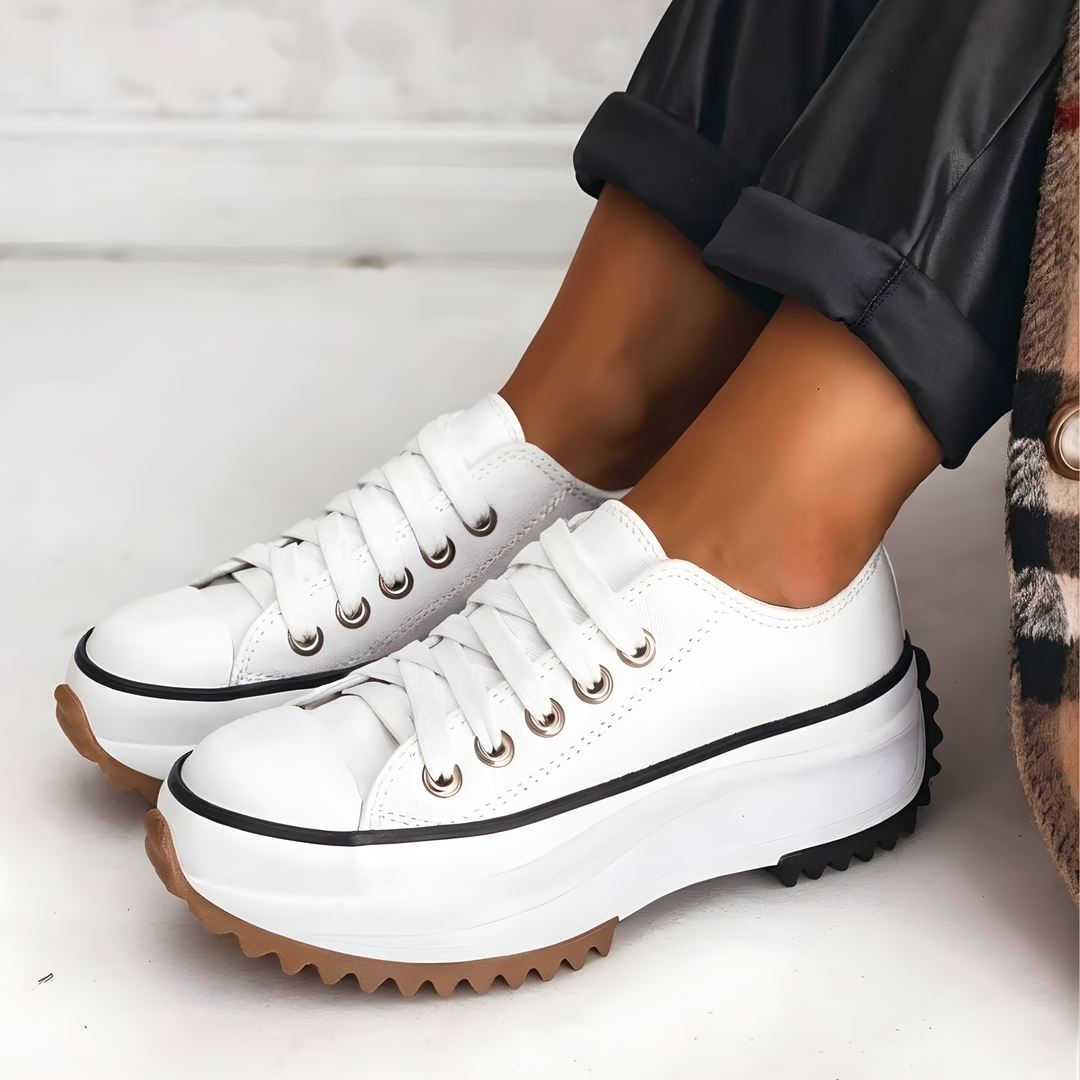 Women's orthopedic comfort sneakers, ideal for walking, with arch support, cushioned sole, and stylish design.