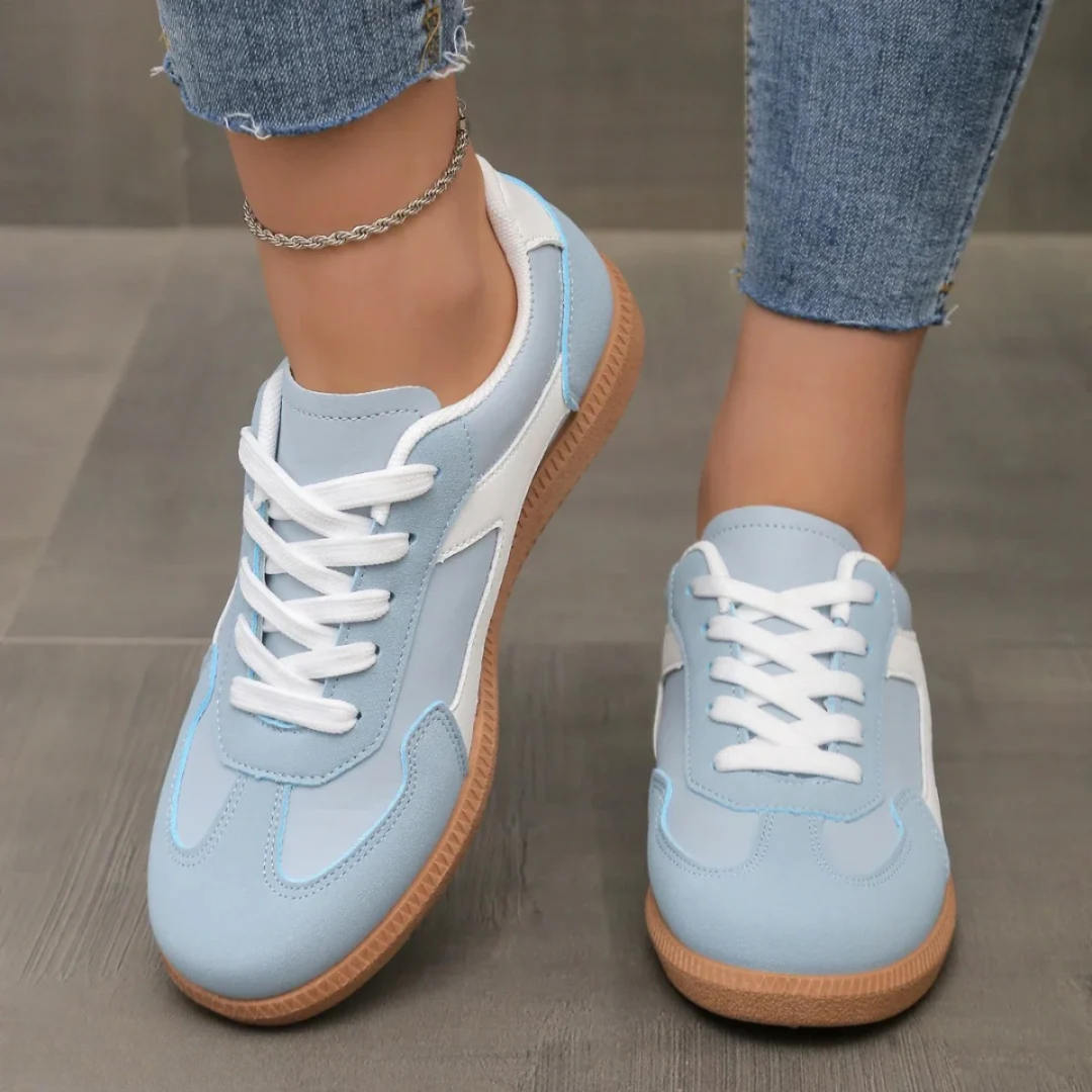 Supportive women's sneakers with cushioned sole for active wear & comfortable walking. Great for daily foot health.