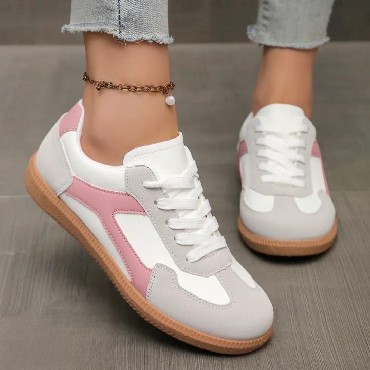 Stylish women's orthopedic walking sneakers, offering arch support & cushioning for all-day comfort & daily wear.