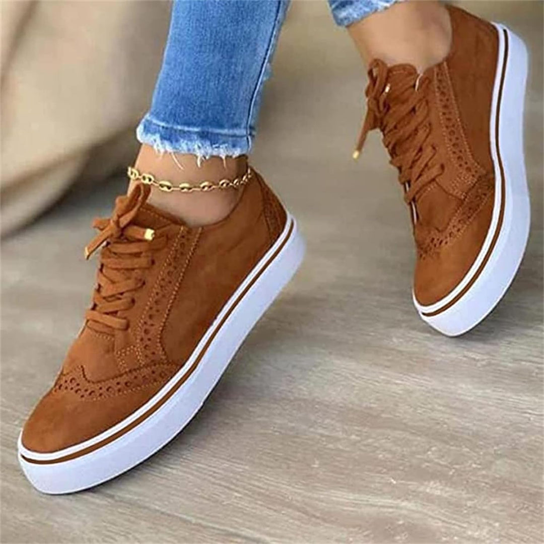 Premium women's comfort sneakers with integrated arch support, perfect for long walks and daily activities.