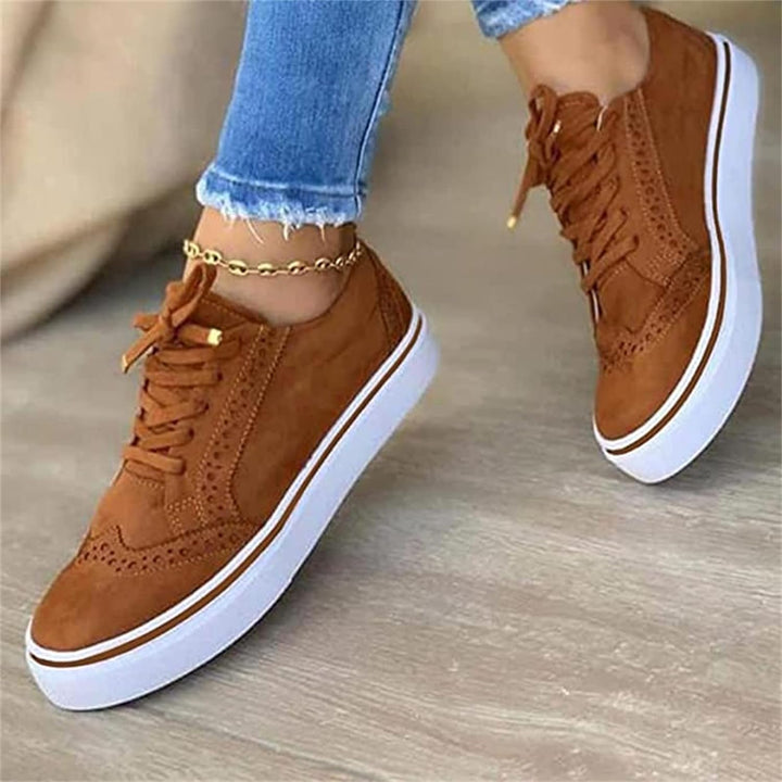 Premium women's comfort sneakers with integrated arch support, perfect for long walks and daily activities.