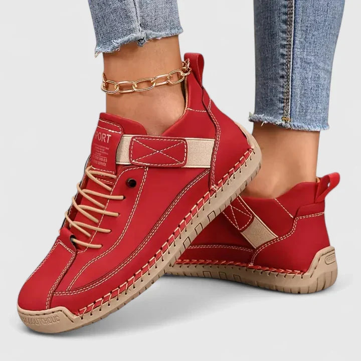 Daily wear women's sneakers, cushioned and orthopedic with convenient strap closure.