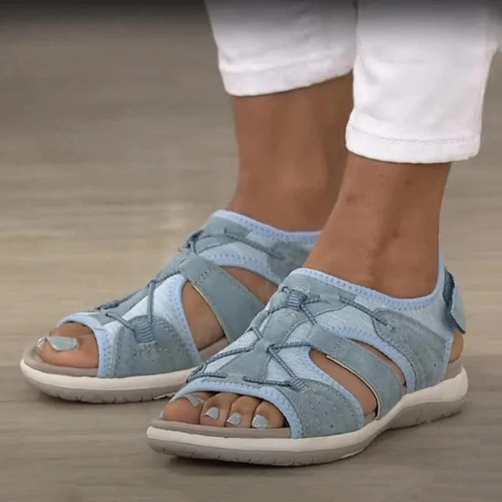 Women's orthopedic summer sandals with adjustable strap & stylish cut-out design for comfort & arch support.