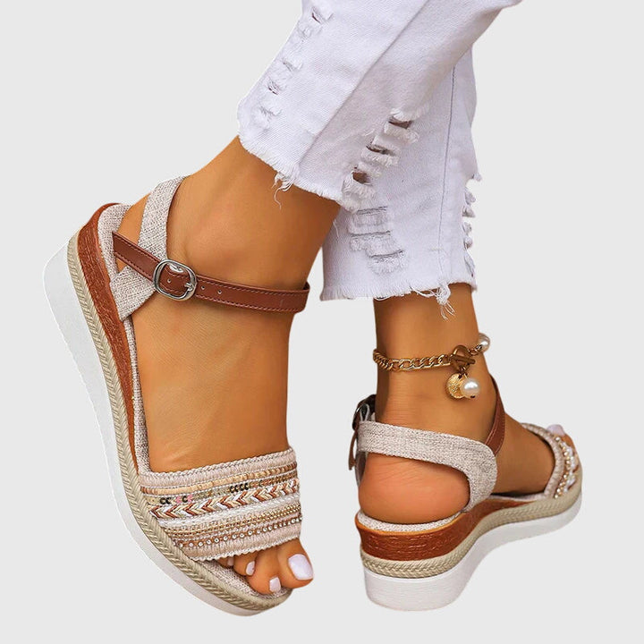 Comfortable flat sandals for women, ideal summer footwear offering orthopedic arch support & style.