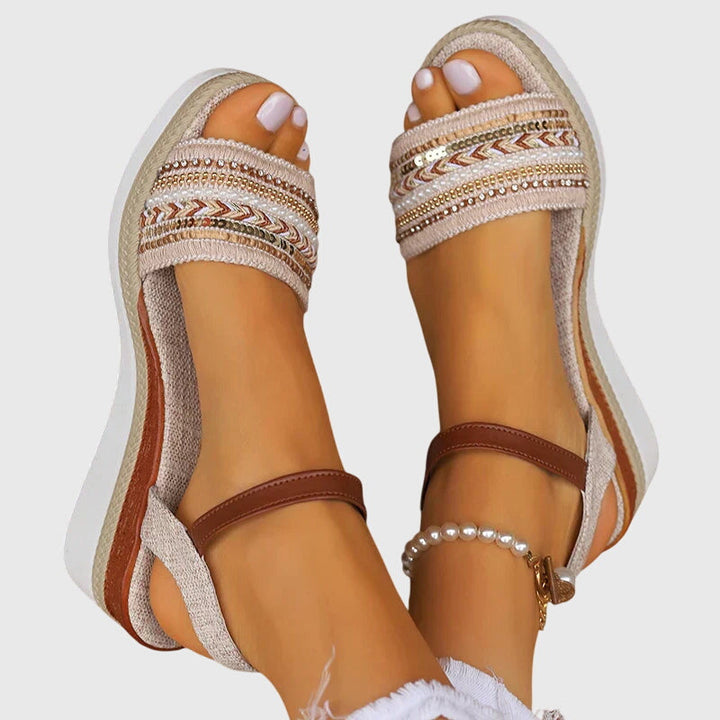 Pair of fashionable women's summer sandals, orthopedic design ensures comfortable all-day support.