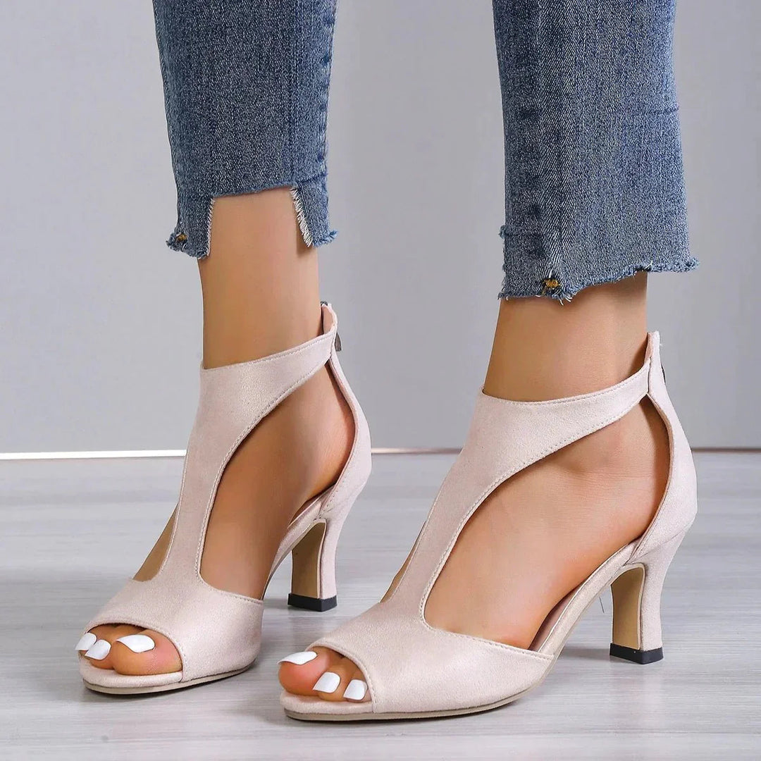 Stylish women's orthopedic T-strap open-toe heels, offering modern fashion and essential arch support.