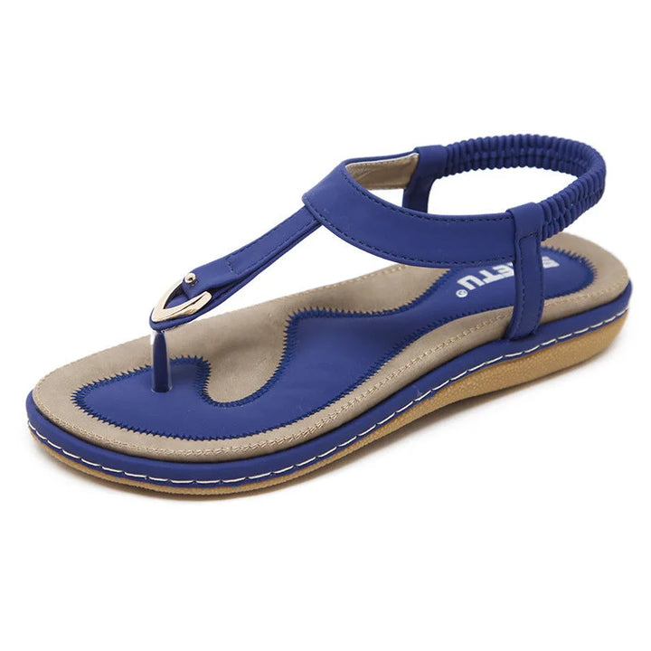 Supportive women's orthopedic sandals with arch support and secure T-strap for all-day comfort.