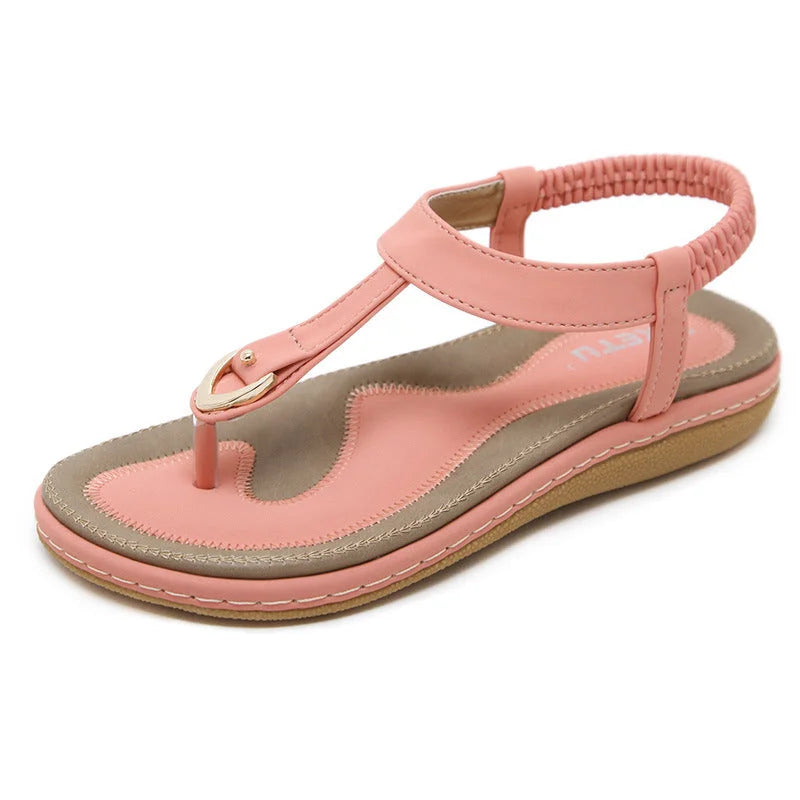 Comfortable women's summer T-strap sandals with orthopedic arch support and elastic strap.
