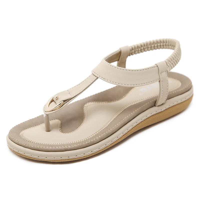 Fashionable women's T-strap sandals with arch support, providing orthopedic comfort & foot health.