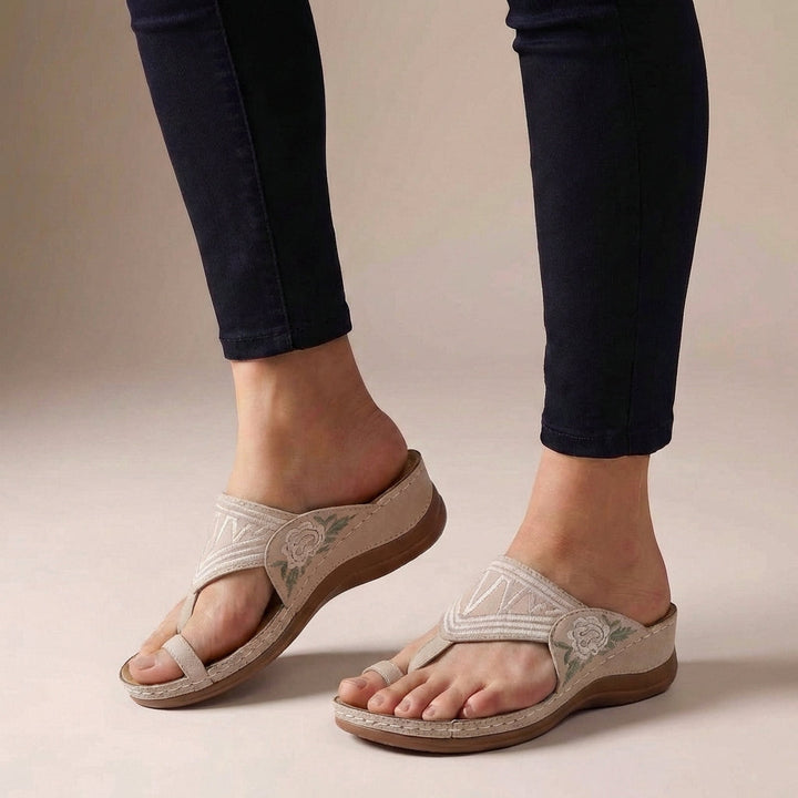 Comfortable women's orthopedic T-strap wedge sandals, ideal for walking & casual summer activities.