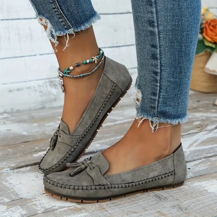 Lightweight women's orthopedic slip-on shoes, fashionable tassel loafers for everyday comfort.