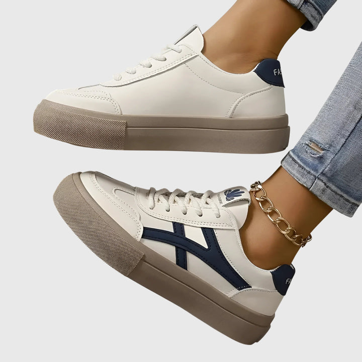 Stylish blue women's orthopedic trainers. Designed for pain relief, comfort, and active everyday wear.
