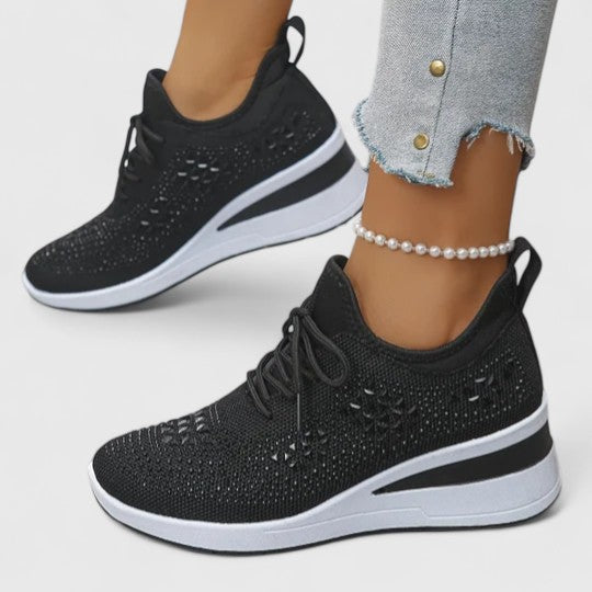 Supportive women's sneakers with ergonomic design, perfect for walking and daily foot pain relief.