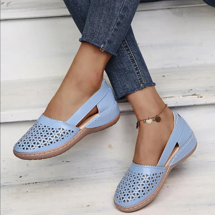 Breathable women's walking shoes with superior orthopedic support for casual and daily comfort.
