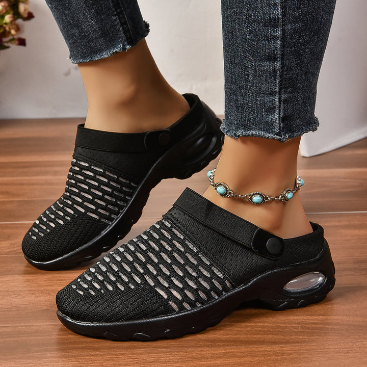 Close-up of women's orthopedic walking shoes, highlighting the breathable mesh upper and air cushion sole.