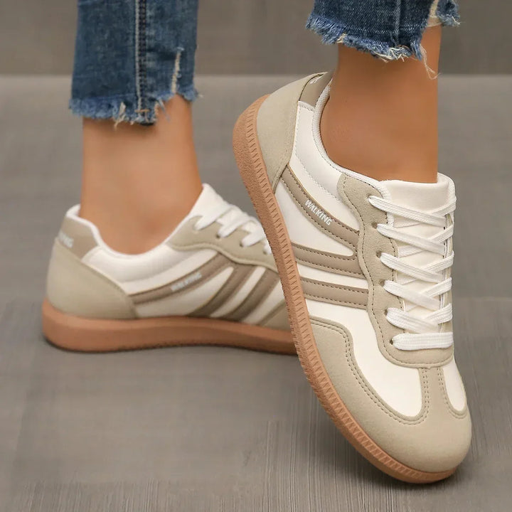 Breathable women's orthopedic sneakers, providing comfortable arch support for casual walking & active footwear.