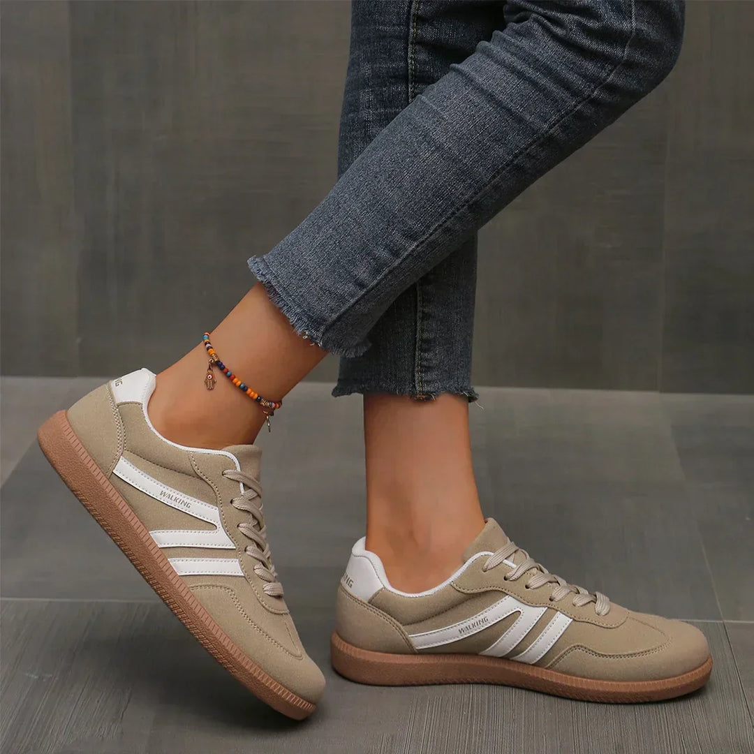 Orthopedic walking sneakers for women, offering superior arch support and comfort for active ladies' everyday footwear.