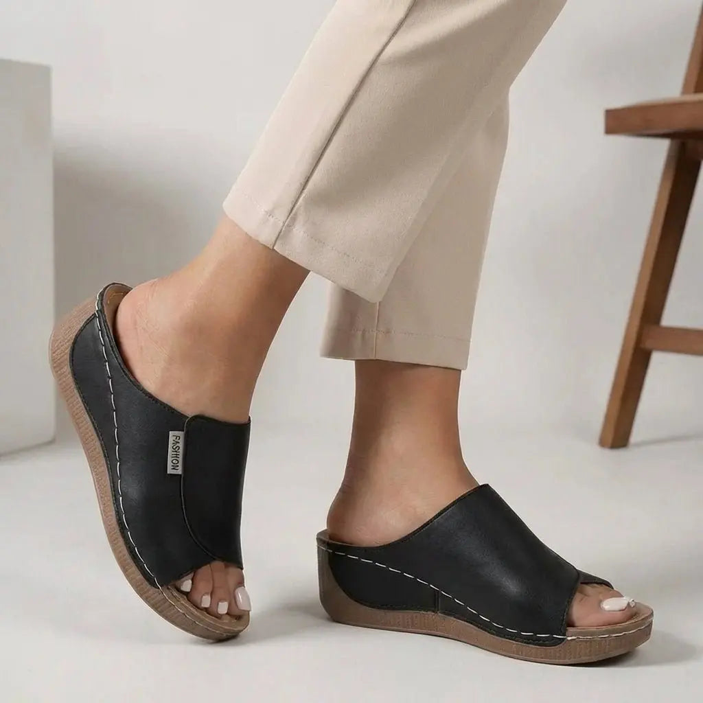 Women's orthopedic wedge heel slip-on slippers with open toe for comfortable summer wear.