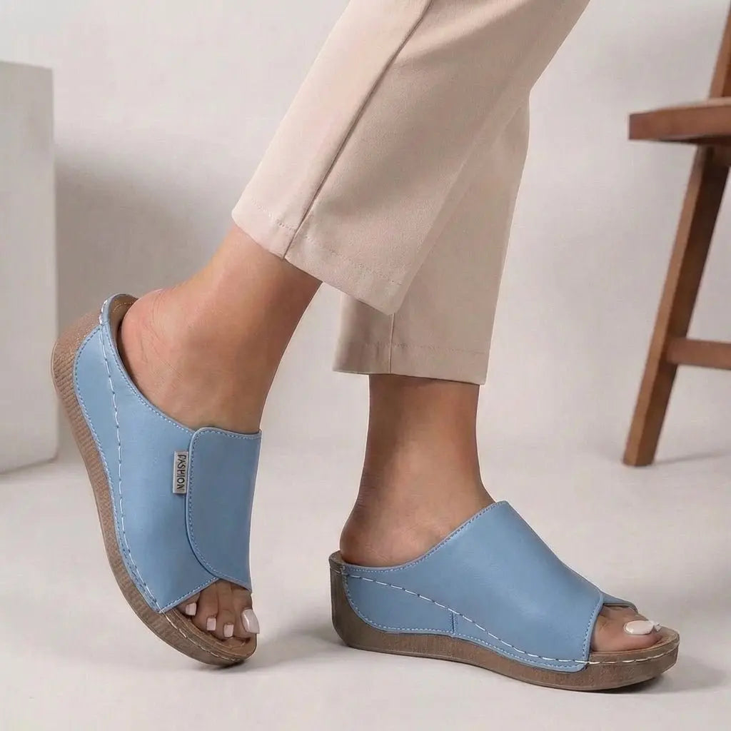 Stylish women's open toe slip-on wedge slippers, ideal comfortable footwear for summer casual.