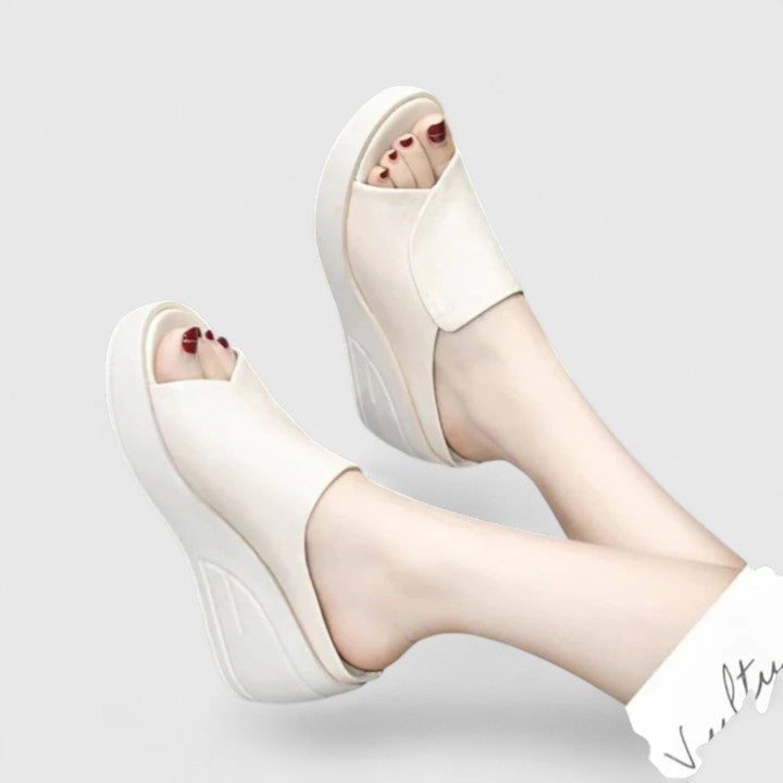 Comfortable women's wedge sandals with advanced arch support and cushioned sole, designed for orthopedic pain relief.
