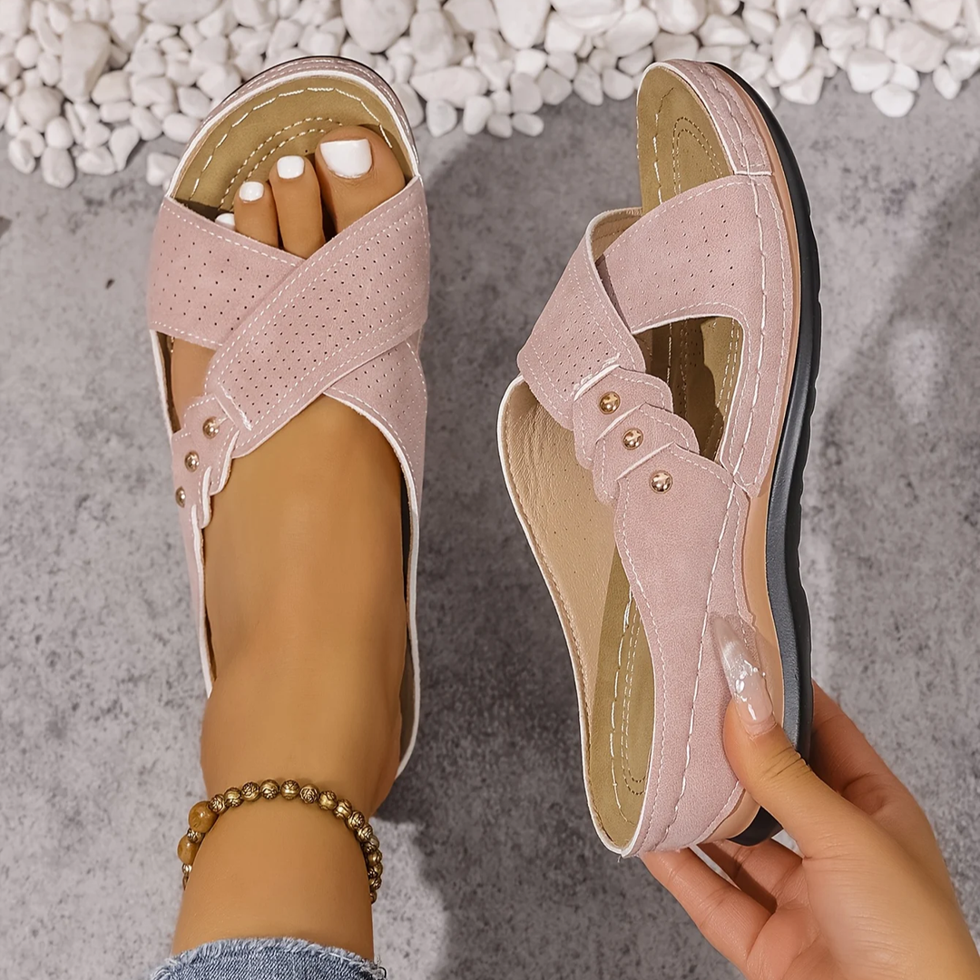 Fashionable women's wedge sandals providing ergonomic orthopedic support & summer elegance.