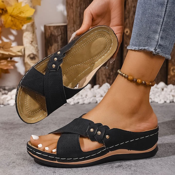 Chic women's wedge sandals, combining stylish design with essential orthopedic support.