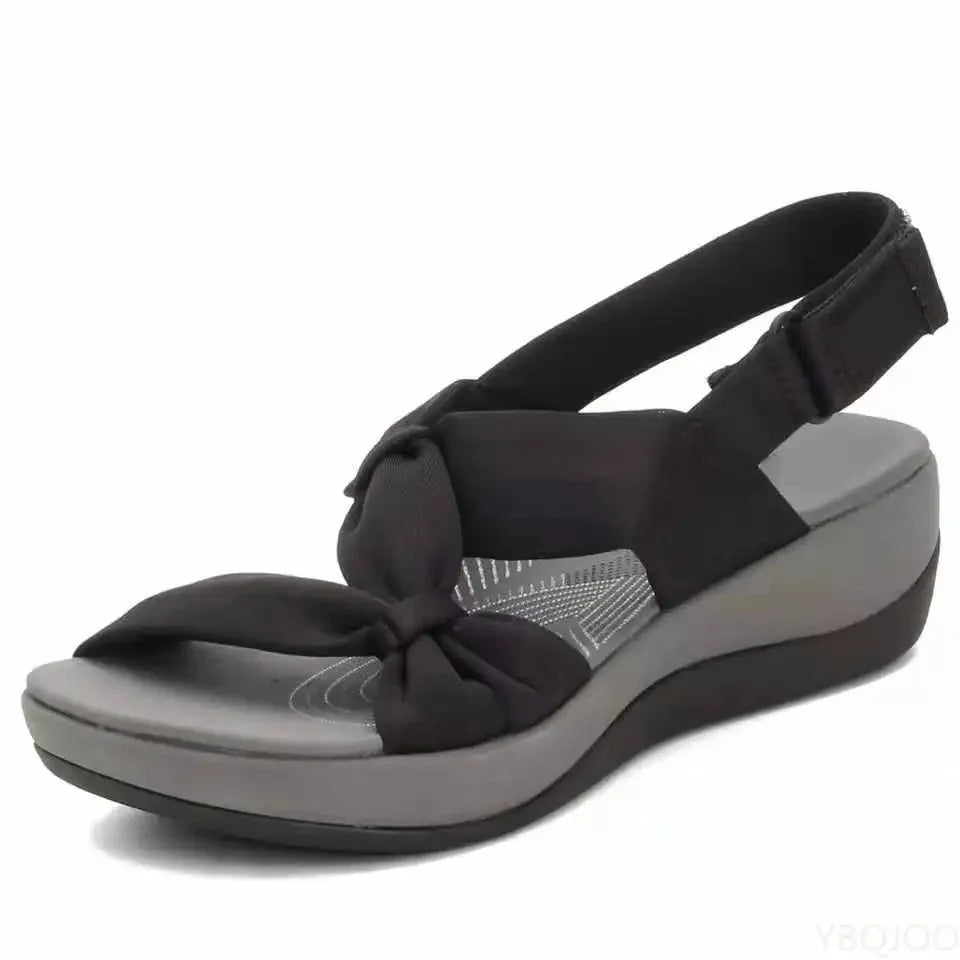Women's orthopedic wedge sandals with adjustable strap, offering arch support & all-day comfort.