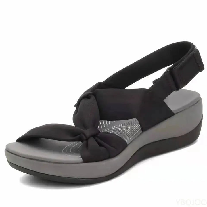 Women's orthopedic wedge sandals with adjustable strap, offering arch support & all-day comfort.