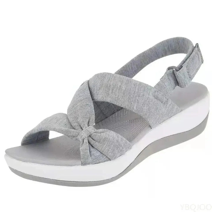 Stylish women's casual chic wedge sandals with adjustable strap, perfect for summer walking & foot health.