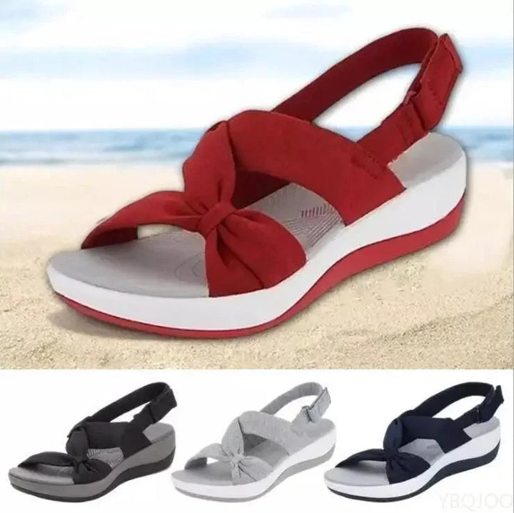 Supportive women's orthopedic wedge sandals, ideal for walking & summer, featuring an adjustable strap.