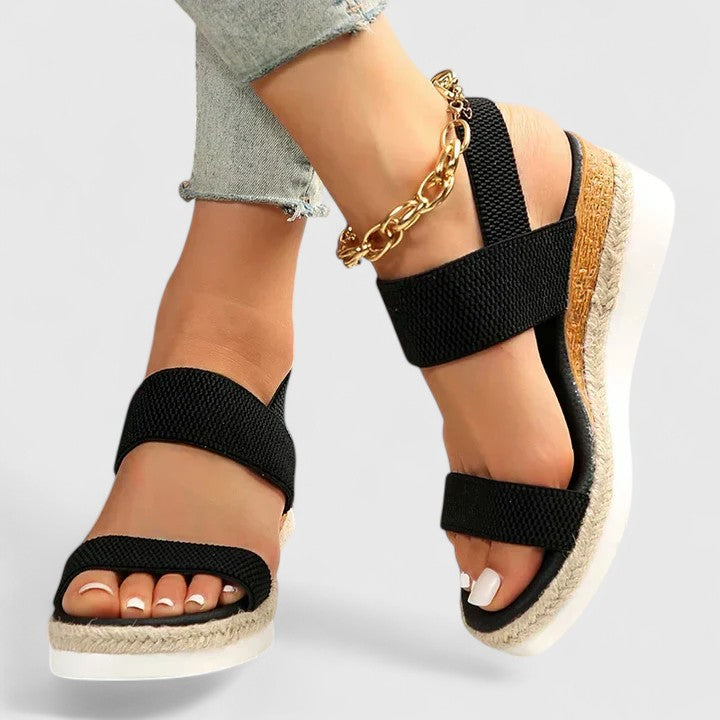 Everyday women's wedge sandals: arch support, cushioned sole, elastic strap.