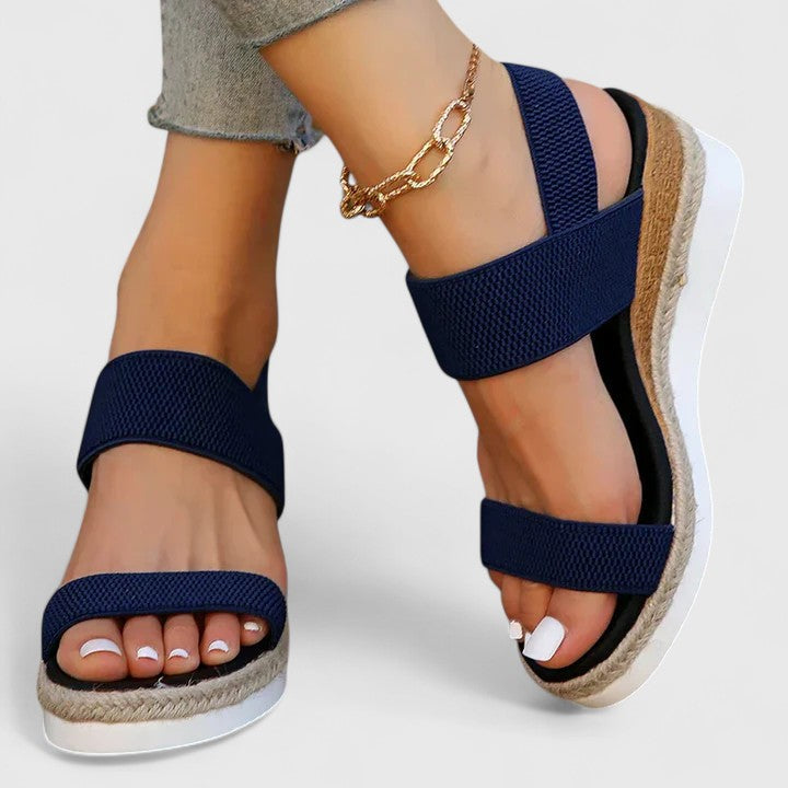 Walking-friendly women's wedge sandals, arch support for happy feet.