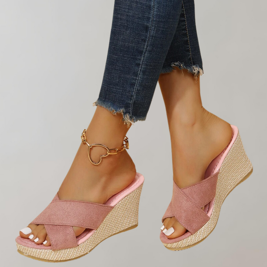 Women's orthopedic wedge sandals with arch support, comfortable crisscross design for stylish summer wear.