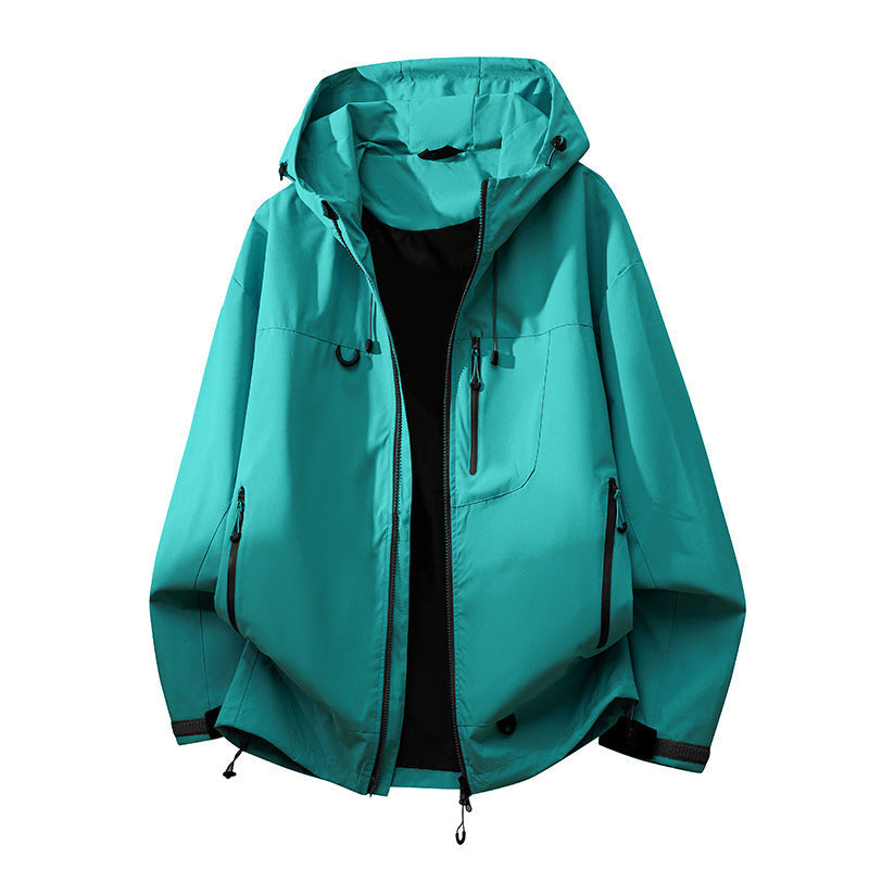 Close-up of adjustable hood on women's outdoor jacket, offering all-weather protection & comfort.