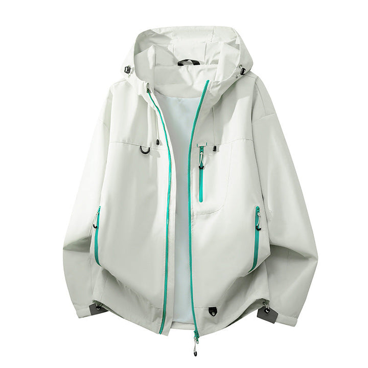 Women's outdoor jacket with functional zippered pockets, ideal for securing essentials on active journeys.