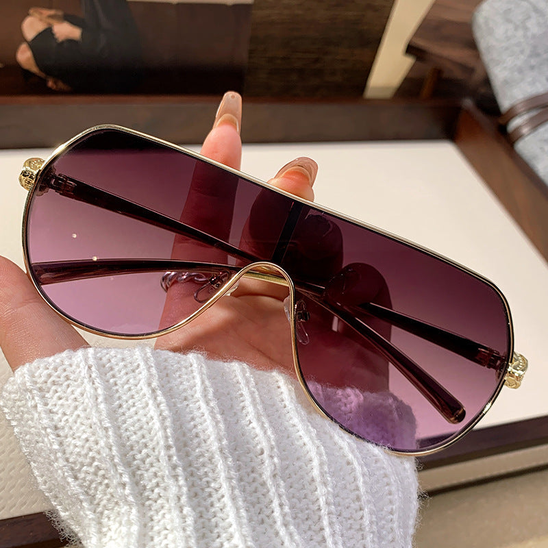 Trendy women's oversized aviator sunglasses, a chic fashion statement with reliable UV protection for summer.