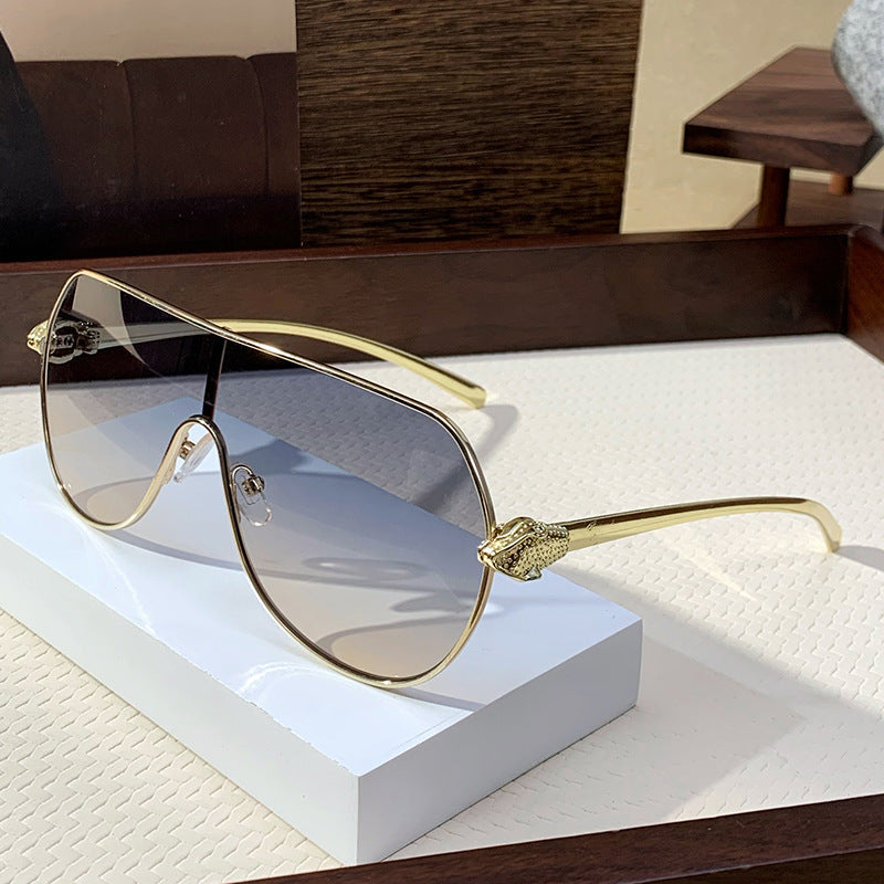 Oversized aviator sunglasses for women, featuring a durable metal frame and essential UV protection.