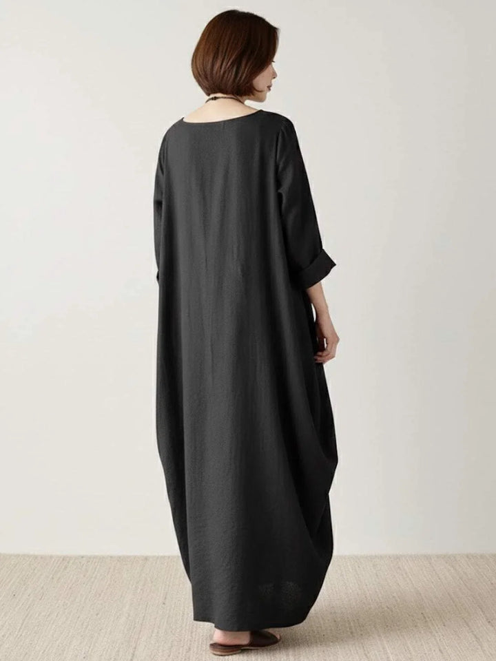 Relaxed fit women's boho maxi dress with 3/4 sleeves, perfect for a stylish casual look.